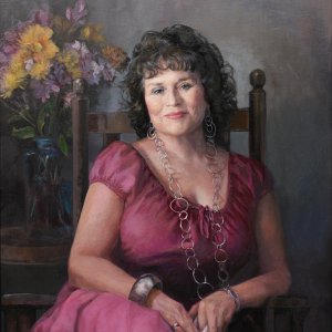 portrait painting of a brunette woman wearing a magenta dress and silver jewelry