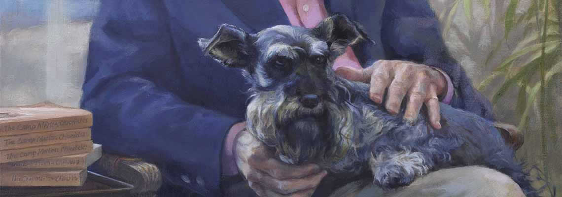 Scottish Terrier on the lap of a man