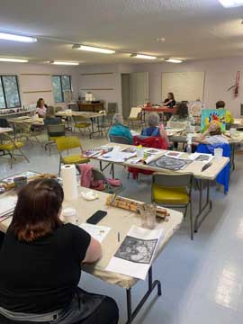people working creatively in a classroom