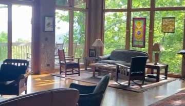 a light-filled mountain lodge setting of furniture