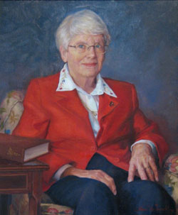 oil portrait painting of a woman with white hair, wearing glasses and a bright red jacket